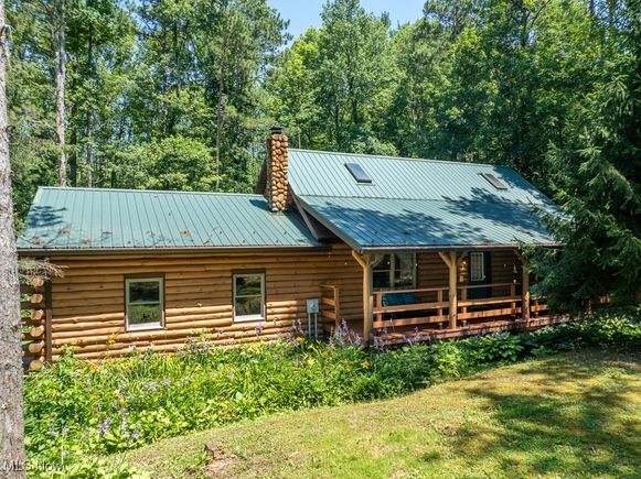 86110 Tappan Highlands Road Uhrichsville, OH House Active - Photo 1 of 40. Opens carousel modal