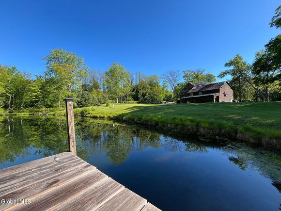 9 Woodchuck Hill Road Queensbury, NY House Active - Photo 1 of 42. Opens carousel modal