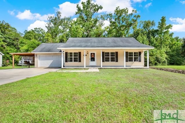 61 Hidden Creek Drive Guyton, GA House Sold - Photo 1 of 38. Opens carousel modal