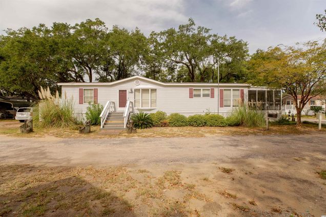 340 Ocean Breeze Dr. Garden City Beach, SC House Sold - Photo 1 of 25. Opens carousel modal