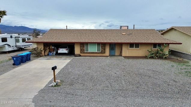 1724 Rainbow Avenue S Lake Havasu City, AZ House Active - Photo 1 of 38. Opens carousel modal