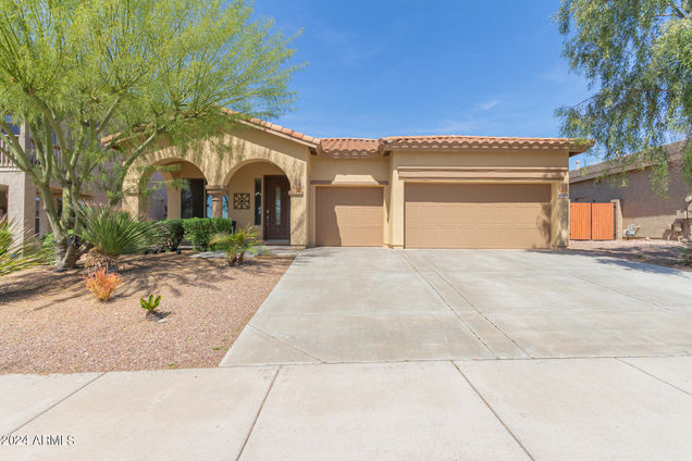 12774 W Dove Wing Way Peoria, AZ House Active - Photo 1 of 48. Opens carousel modal