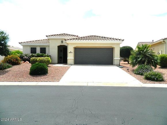 22816 N Las Positas Drive Sun City West, AZ House Active - Photo 1 of 20. Opens carousel modal