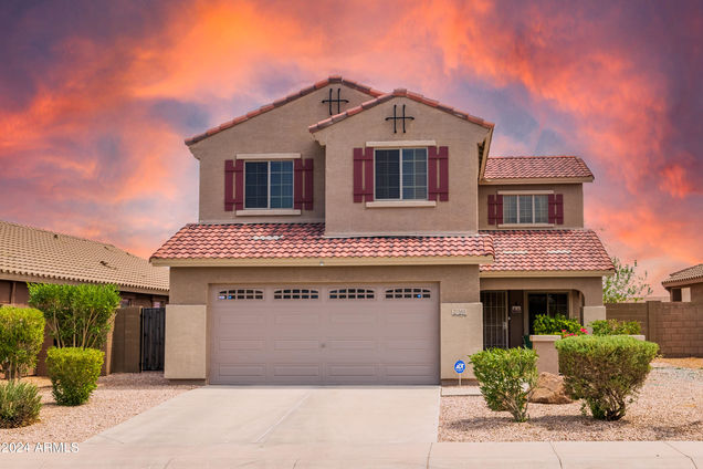 21565 W Hilton Avenue Buckeye, AZ House Sold - Photo 1 of 86. Opens carousel modal