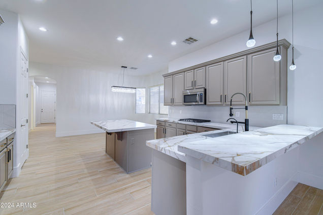 1270 E Baranca Road Gilbert, AZ House Active - Photo 1 of 51. Opens carousel modal