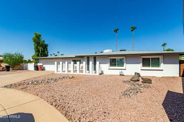 8714 E Mackenzie Drive Scottsdale, AZ House Active - Photo 1 of 37. Opens carousel modal