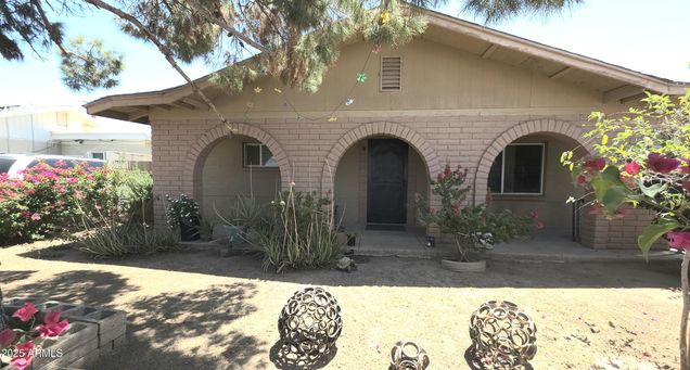 417 N 38th Avenue Phoenix, AZ House Sold - Photo 1 of 20. Opens carousel modal