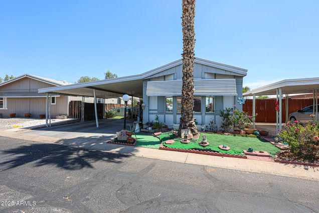 10951 N 91st Avenue Peoria, AZ House Active - Photo 1 of 27. Opens carousel modal