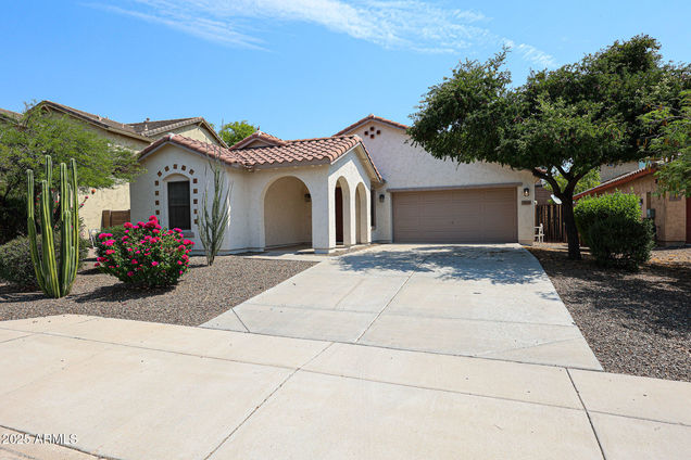 12848 W Desert Mirage Drive Peoria, AZ House Active - Photo 1 of 36. Opens carousel modal