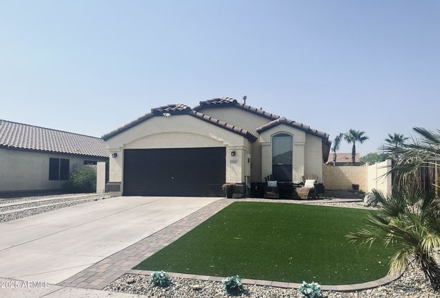 10246 W Jessie Lane Peoria, AZ House Active - Photo 1 of 14. Opens carousel modal