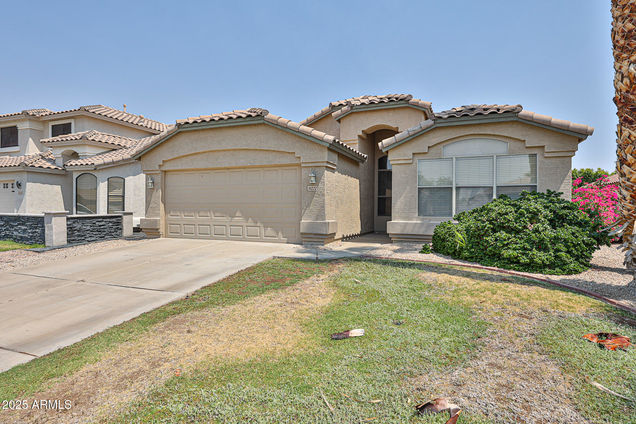 10222 W Daley Lane Peoria, AZ House Active - Photo 1 of 38. Opens carousel modal