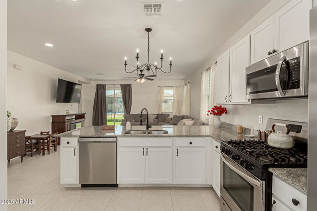 9330 W Getty Drive Tolleson, AZ House Active - Photo 1 of 22. Opens carousel modal