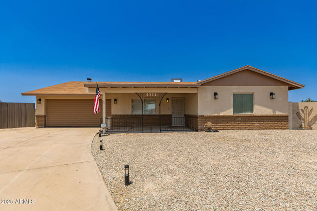 4311 N 80th Lane Phoenix, AZ House Active - Photo 1 of 29. Opens carousel modal