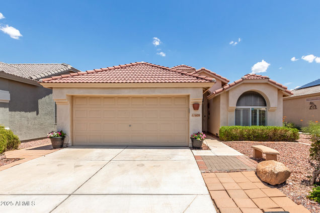 11609 W Hackberry Mountain Court Surprise, AZ House Active - Photo 1 of 52. Opens carousel modal