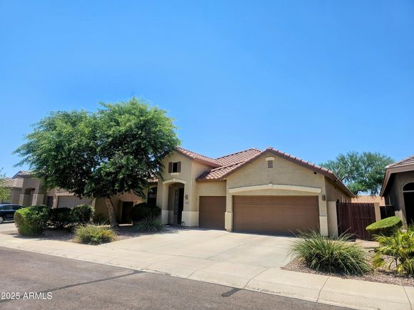 22128 N 104th Lane Peoria, AZ House Active - Photo 1 of 15. Opens carousel modal