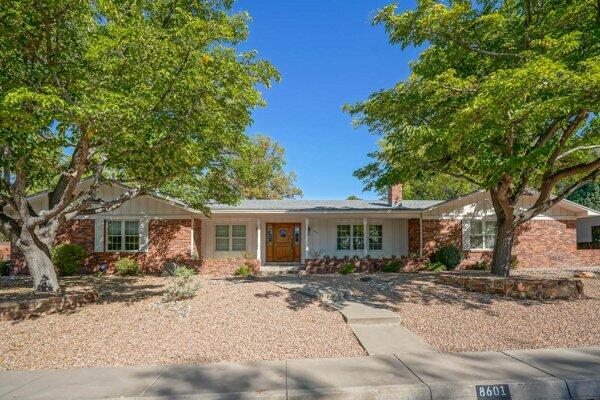 8601 La Sala Del Sur NE Albuquerque, NM House Sold - Photo 1 of 43. Opens carousel modal