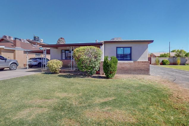 1718 Evergreen Drive SW Albuquerque, NM House Sold - Photo 1 of 55. Opens carousel modal