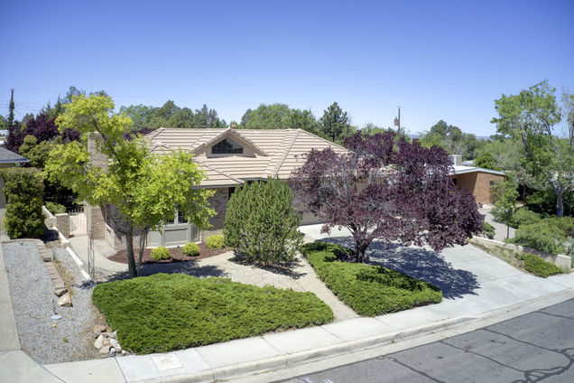 1025 Madison Street NE Albuquerque, NM House Sold - Photo 1 of 48. Opens carousel modal