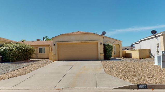 1961 Strawberry Drive NE Rio Rancho, NM House Active - Photo 1 of 13. Opens carousel modal