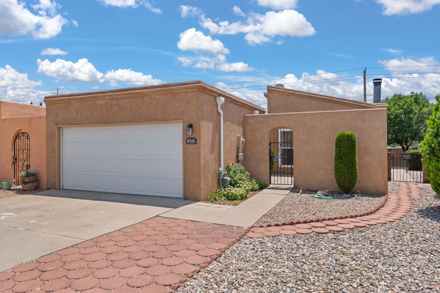 5725 Elmwood Drive NE Albuquerque, NM House Active - Photo 1 of 29. Opens carousel modal