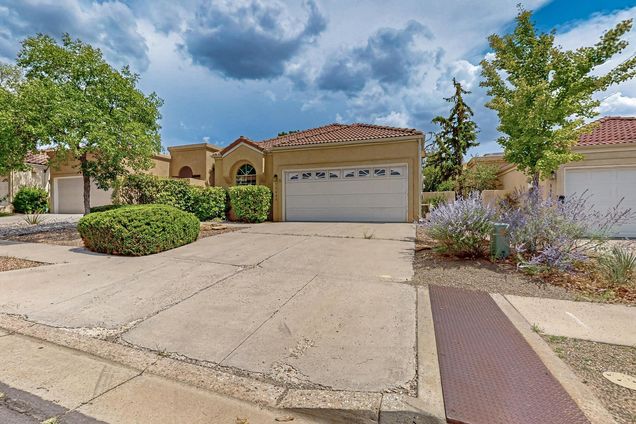 11404 Malaguena Lane NE Albuquerque, NM House Active - Photo 1 of 44. Opens carousel modal