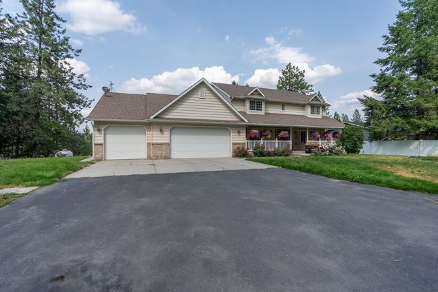 15308 W Bluegrass Rd Nine Mile Falls, WA House Active - Photo 1 of 50. Opens carousel modal