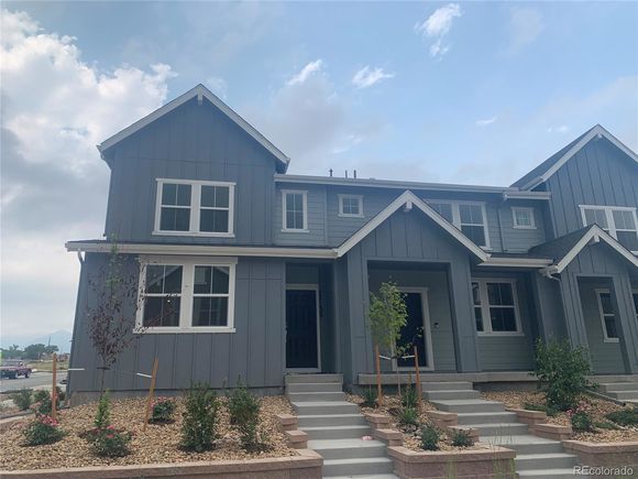17133 W 91st Lane Arvada, CO Townhouse Active - Photo 1 of 33. Opens carousel modal
