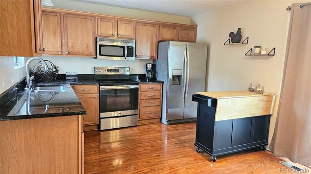 16057 E Rice Place Unit A Aurora, CO Townhouse Active - Photo 1 of 9. Opens carousel modal