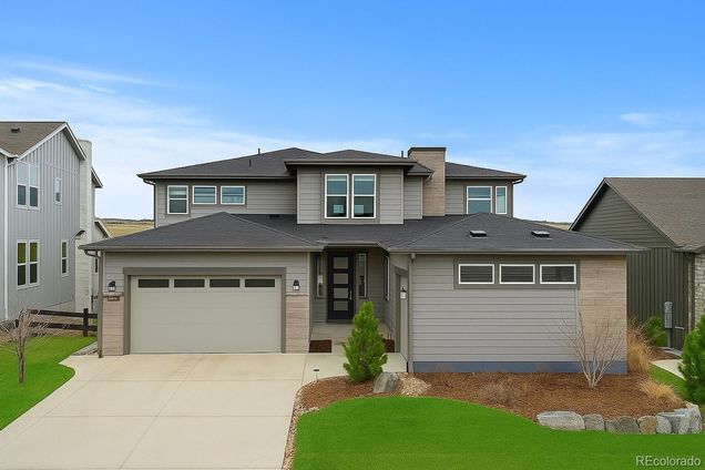 7077 Copper Sky Circle Castle Pines, CO House Active - Photo 1 of 44. Opens carousel modal