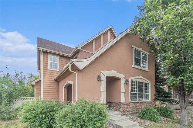 12997 Wyandot Way Denver, CO House Active - Photo 1 of 32. Opens carousel modal