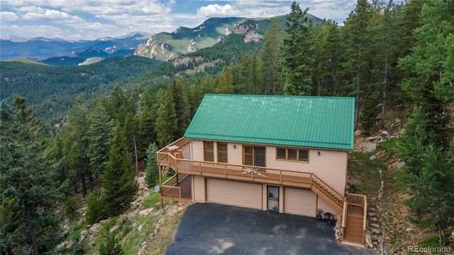 31320 Timothys Trail Conifer, CO House Active - Photo 1 of 46. Opens carousel modal