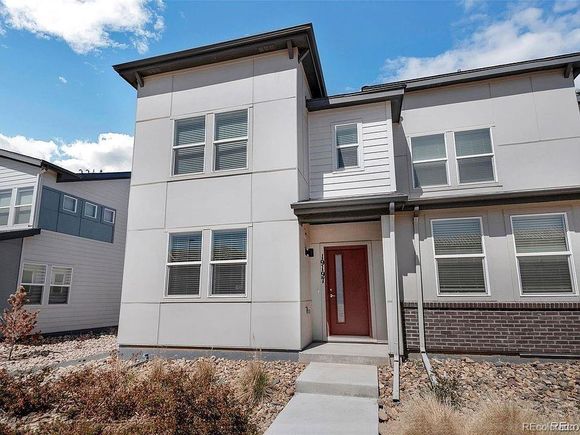 19197 E 64th Avenue Denver, CO Townhouse Active - Photo 1 of 27. Opens carousel modal