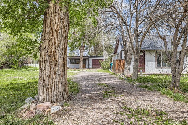 1115 W Quincy Avenue Englewood, CO House Sold - Photo 1 of 31. Opens carousel modal