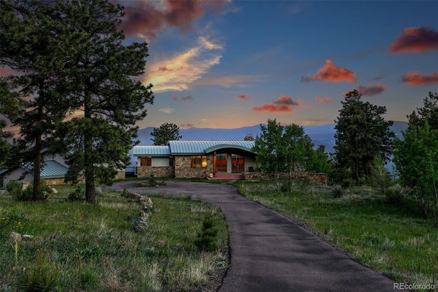 3965 Douglas Mountain Drive Golden, CO House Active - Photo 1 of 47. Opens carousel modal