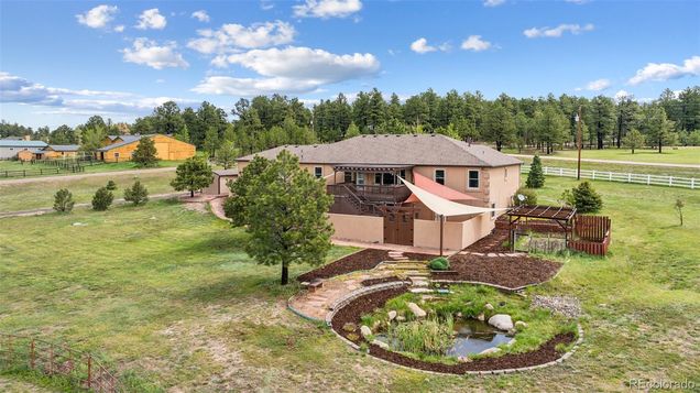 7755 Pine Cone Road Colorado Springs, CO House Active - Photo 1 of 50. Opens carousel modal