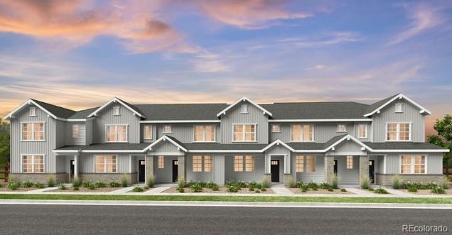 17153 W 91st Lane Arvada, CO Townhouse Sold - Photo 1 of 39. Opens carousel modal