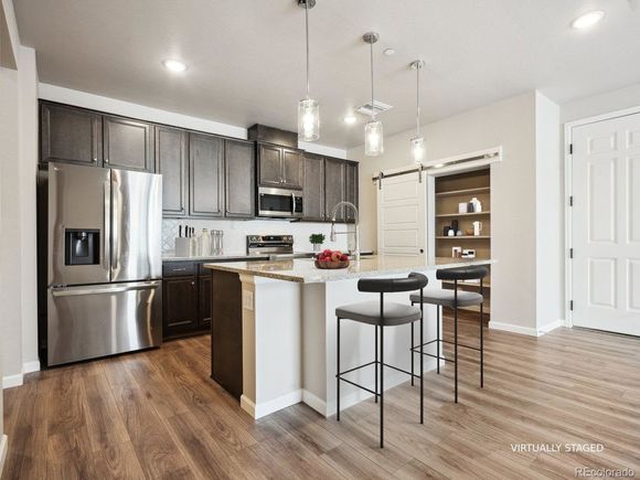 Gateway Commons - 6153 N Ceylon Street Unit 303 Denver, CO Condo Active - Photo 1 of 25. Opens carousel modal