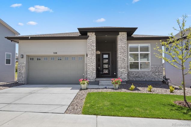 328 Simmental Loop Castle Rock, CO House Active - Photo 1 of 20. Opens carousel modal
