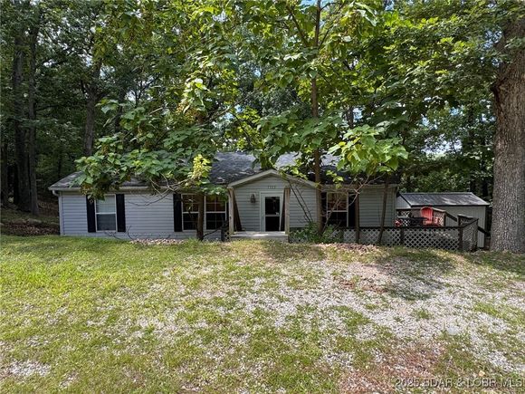 1389 Chimney Point Sunrise Beach, MO House Active - Photo 1 of 31. Opens carousel modal