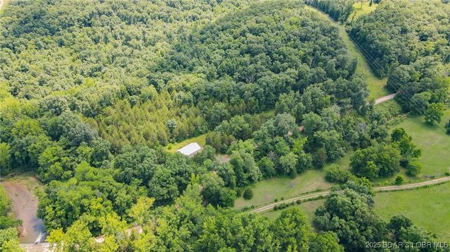 12960 Canyon Road Dixon, MO Land Active - Photo 1 of 50. Opens carousel modal