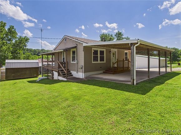 25253 Pelican Road Gravois Mills, MO House Active - Photo 1 of 35. Opens carousel modal