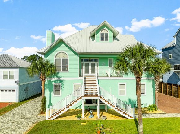 921 Lighthouse Lagoon Court Panama City Beach, FL House Active - Photo 1 of 70. Opens carousel modal