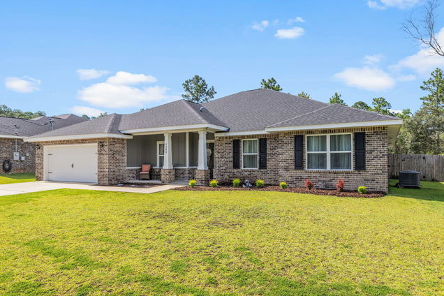7283 Gordon Evans Road Navarre, FL House Active - Photo 1 of 62. Opens carousel modal
