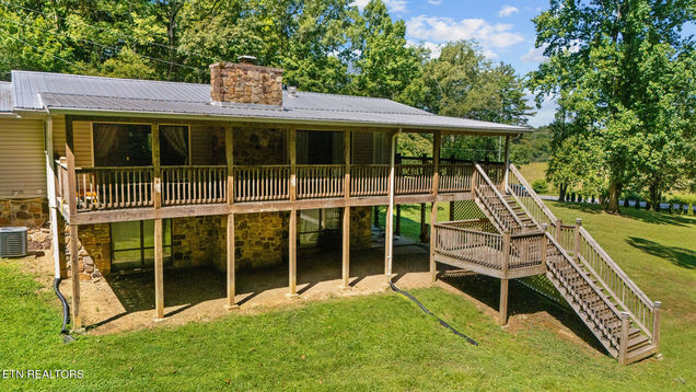 1057 Topside Drive Sevierville, TN House Active - Photo 1 of 44. Opens carousel modal