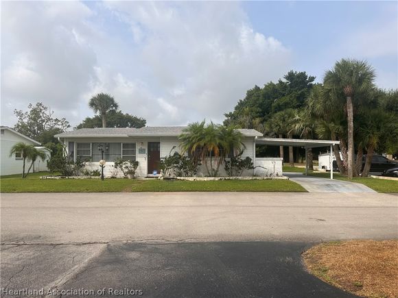 118 Country Club Drive Lake Placid, FL House Sold - Photo 1 of 11. Opens carousel modal