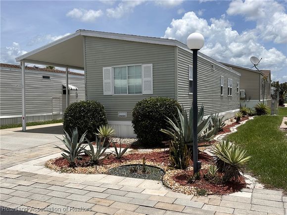 7735 Bluff Boulevard Zolfo Springs, FL House Active - Photo 1 of 50. Opens carousel modal