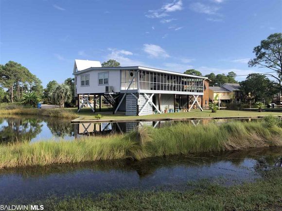 410 W 4th Street Gulf Shores, AL House Sold - Photo 1 of 17. Opens carousel modal