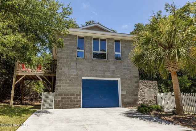 412 Wild Cherry Lane Emerald Isle, NC House Active - Photo 1 of 41. Opens carousel modal