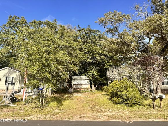 310 NE 75th Street Oak Island, NC Plot of land Active - Photo 1 of 18. Opens carousel modal