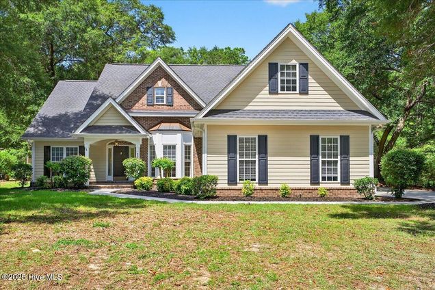 8985 Woodbine Road Sunset Beach, NC House Active - Photo 1 of 56. Opens carousel modal